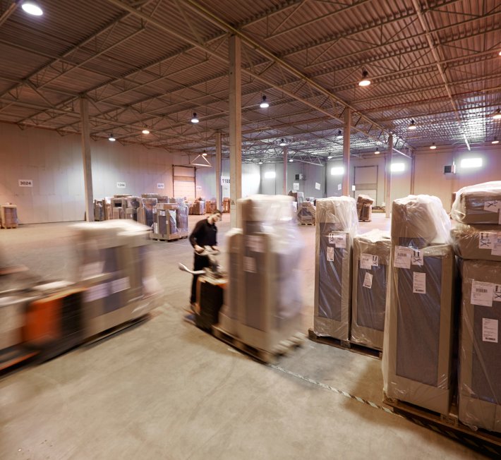 Packed goods being placed in the storage before delivery