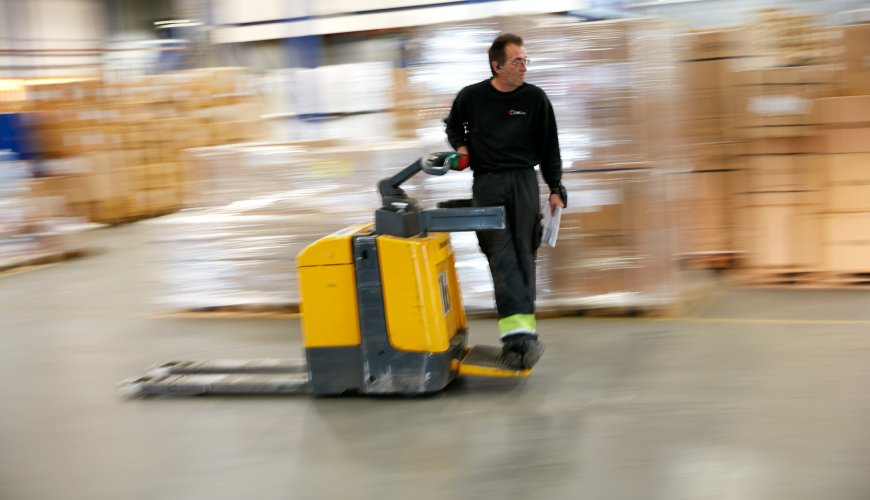 One of ColliCares storage employees controlling the goods at the storage.